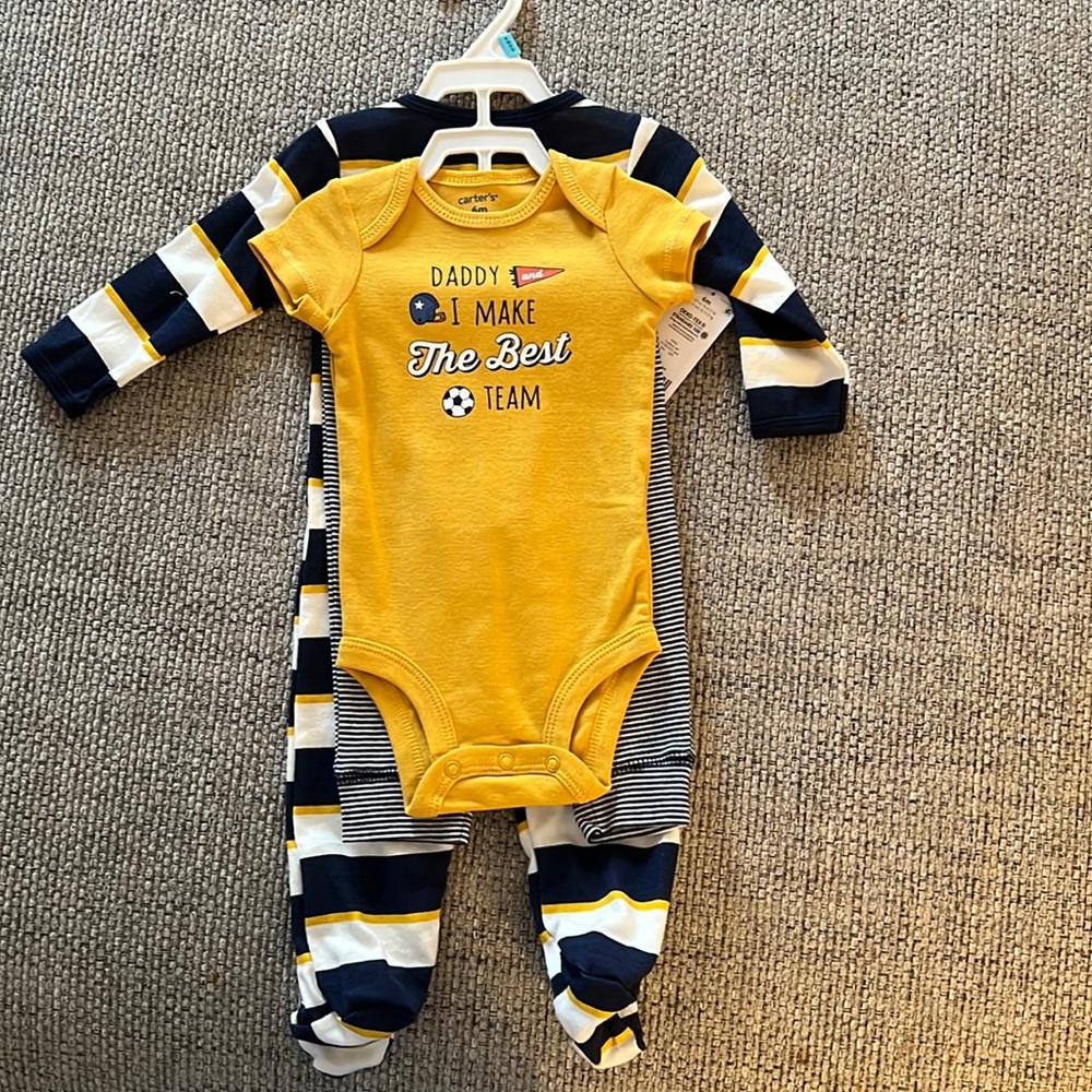 Carters onesie , pants and a full footed onesie